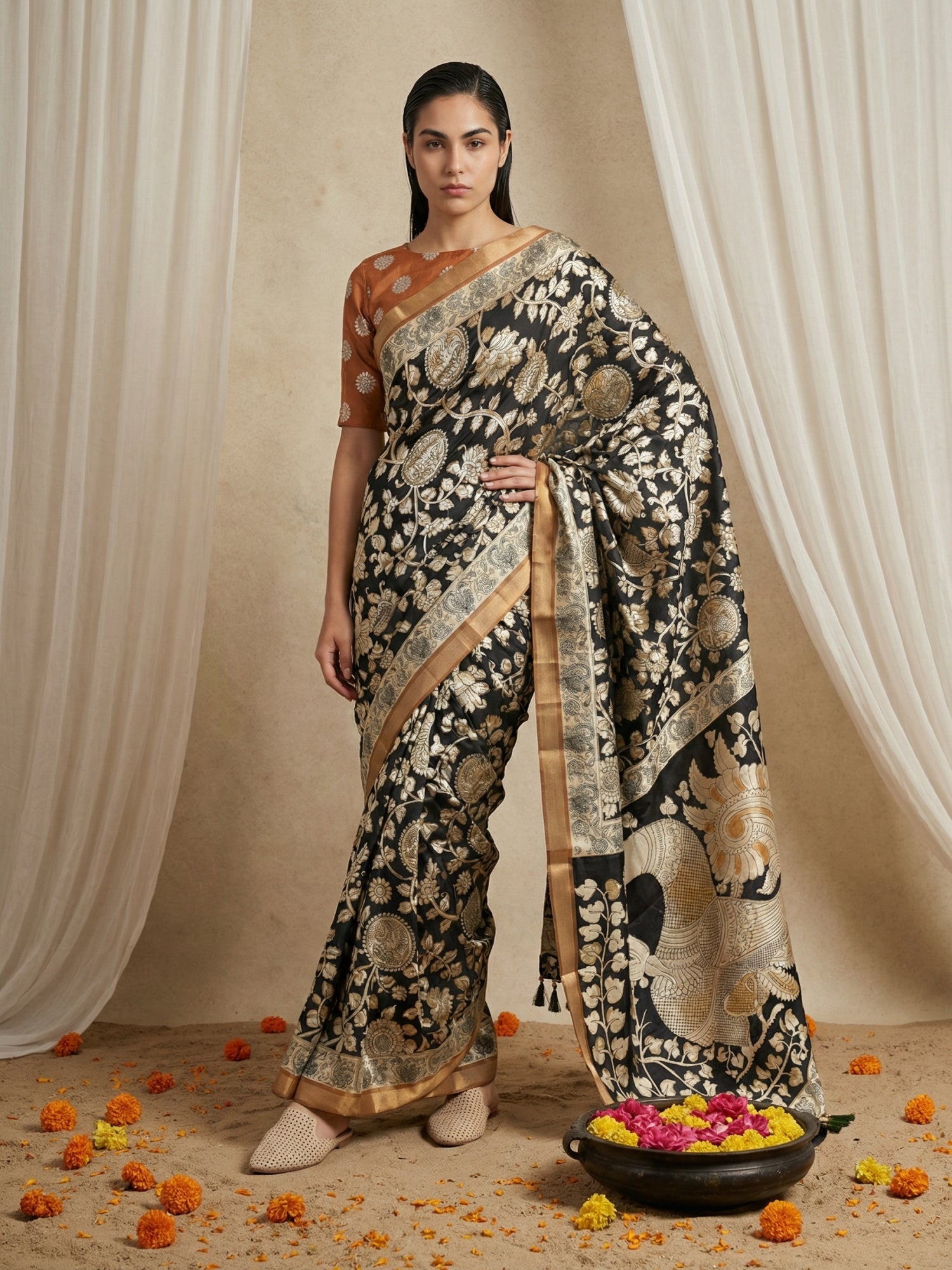 traditional kalamkari saree with peacock printed pallu and tassels