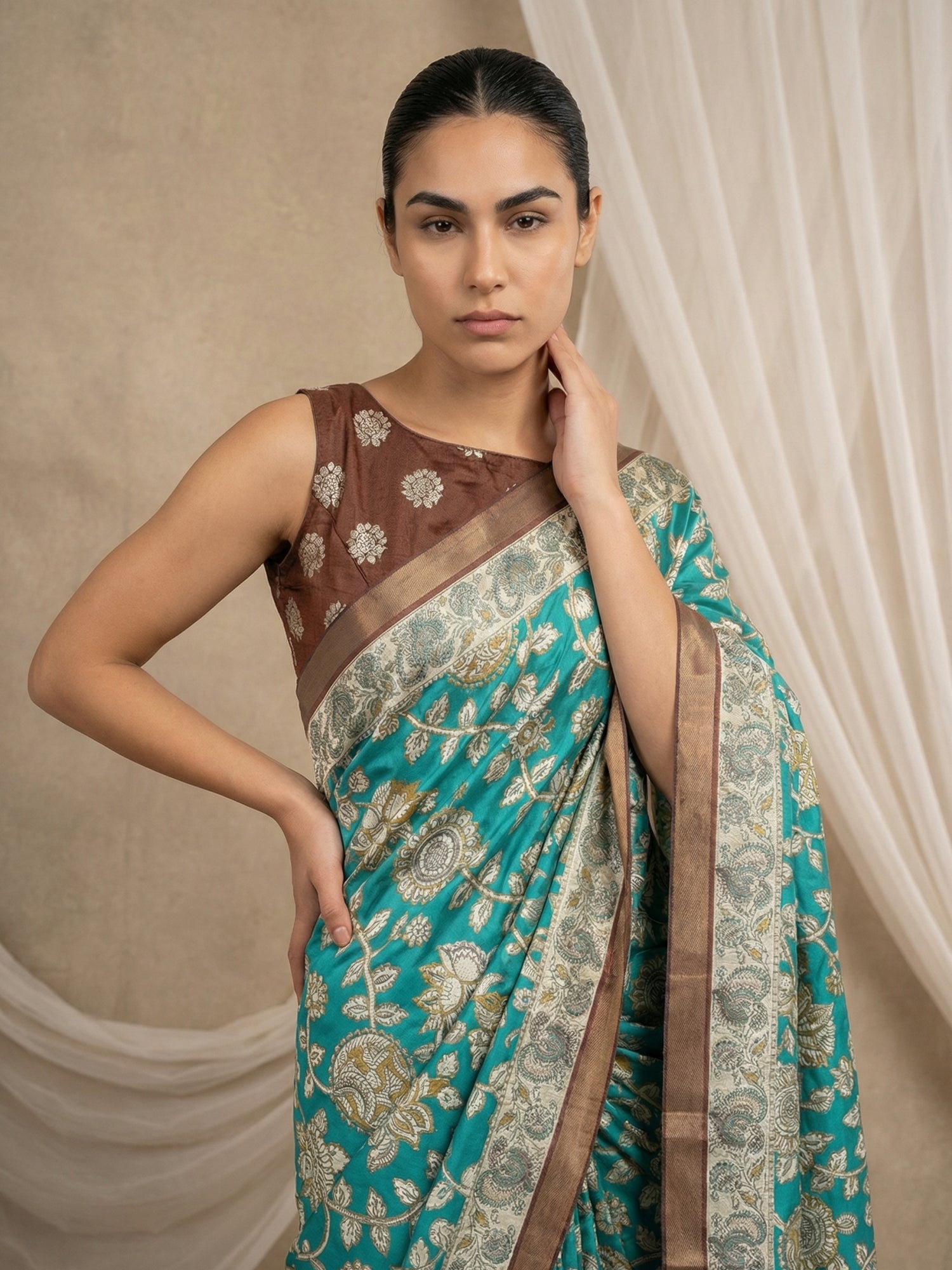 traditional silk saree with peacock printed pallu and tassels