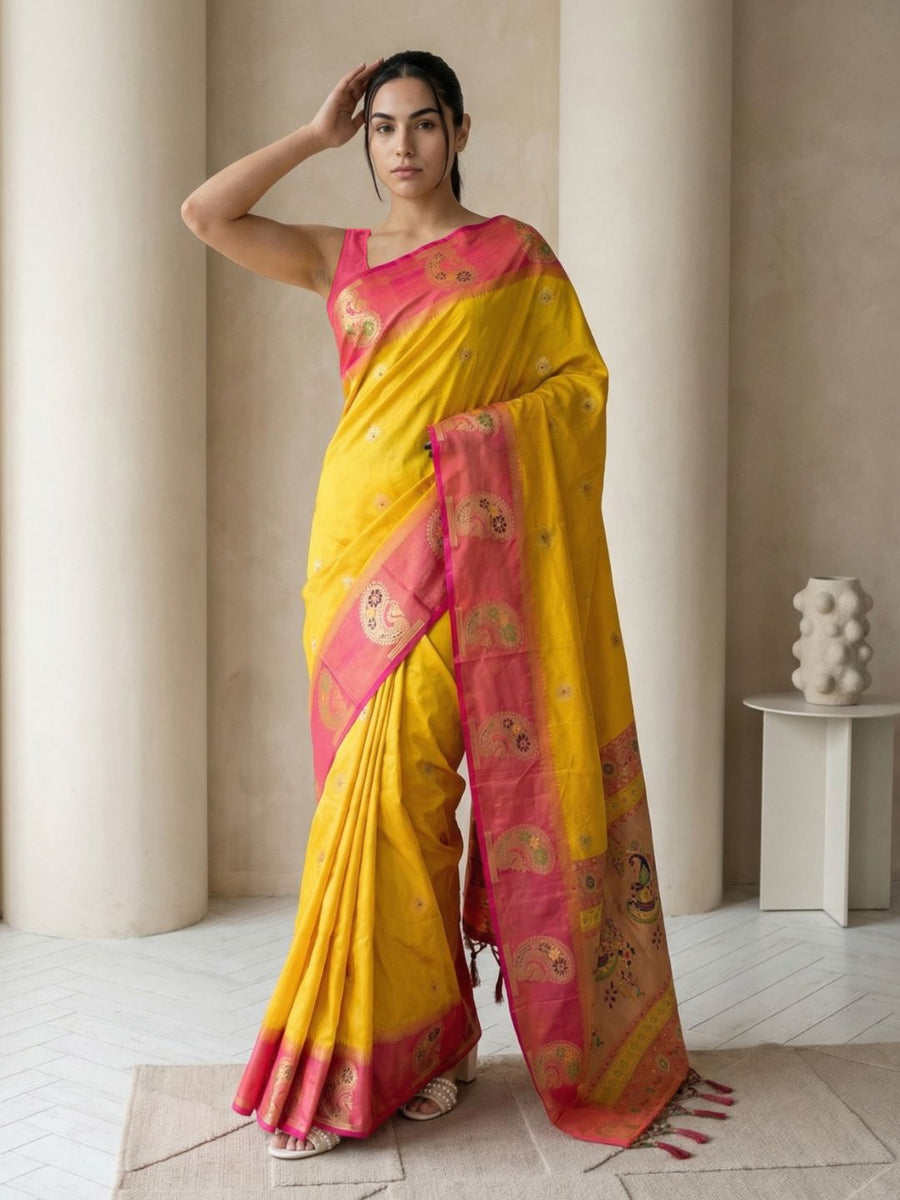 haldi ceremony yellow silk saree with peacock motifs