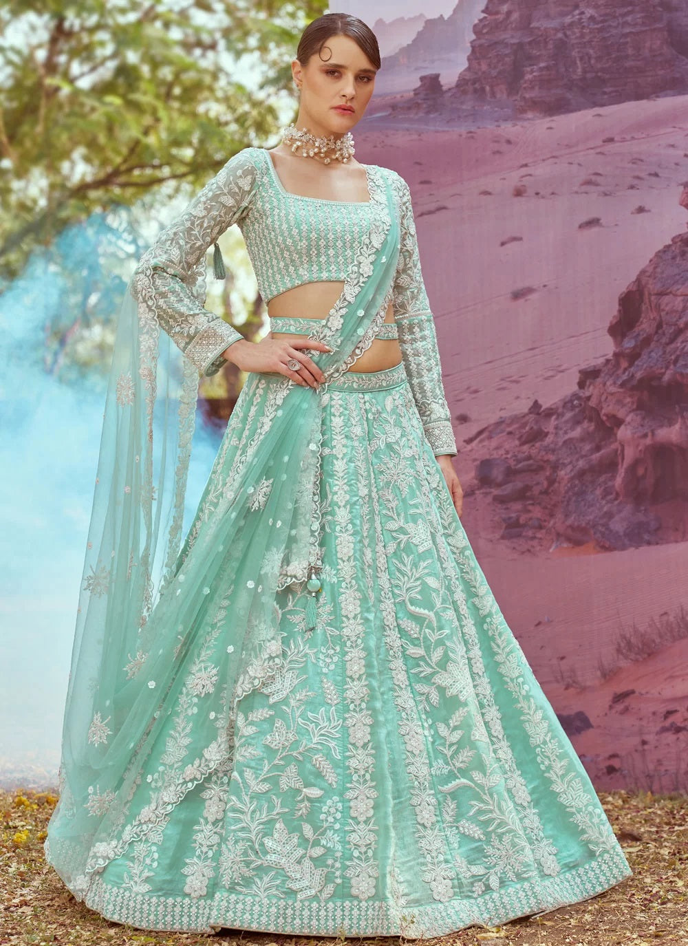 Designer seagreen wedding lehenga with net dupatta


