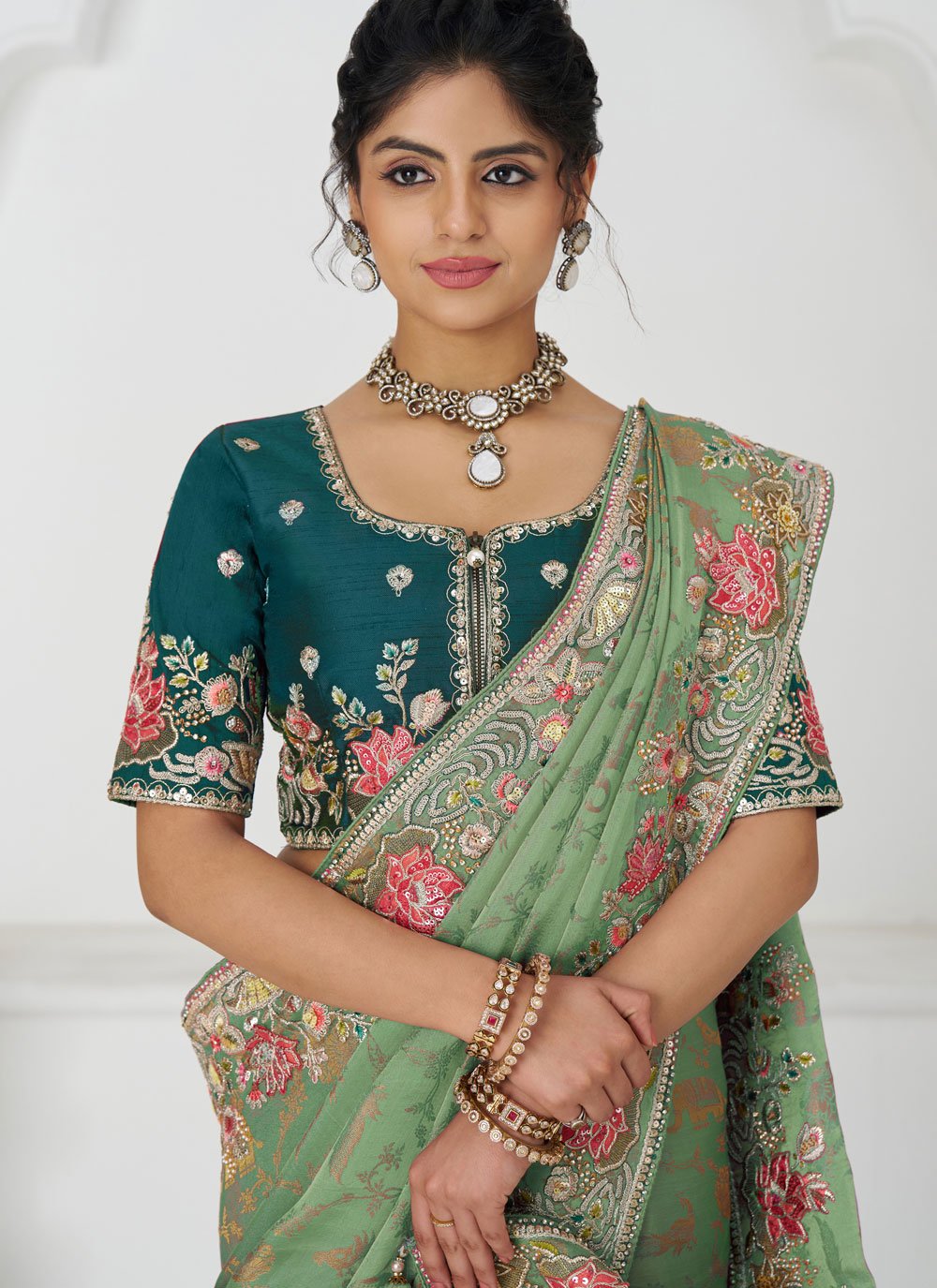 Green Heavy Bridal Saree in Dola Silk with Sequins, Beads, and Floral Motifs