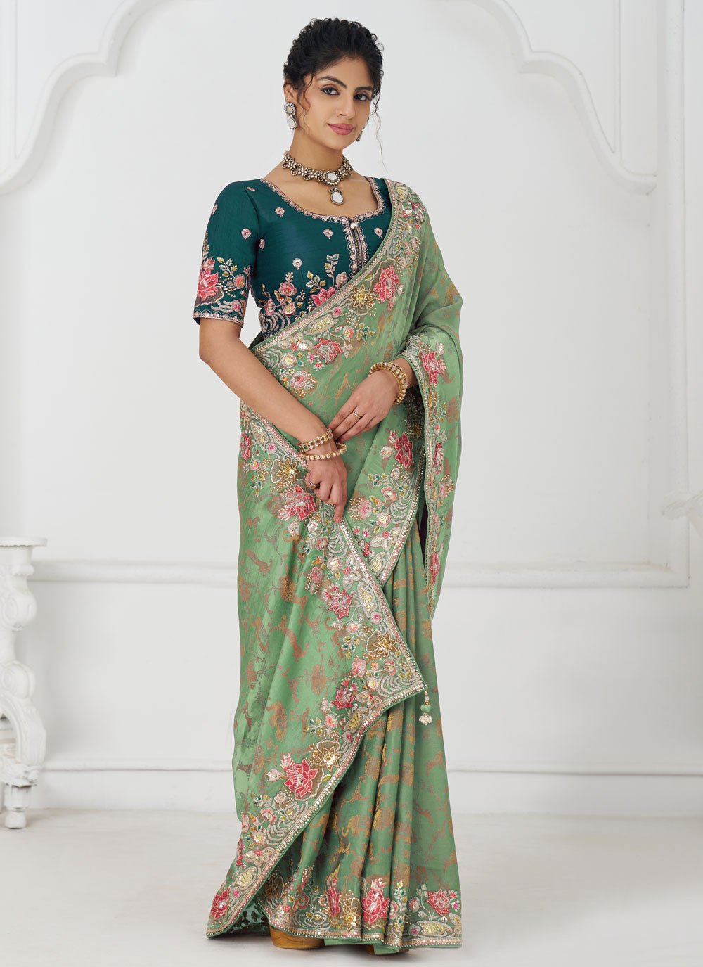 Green Heavy Bridal Saree in Dola Silk with Sequins, Beads, and Floral Motifs