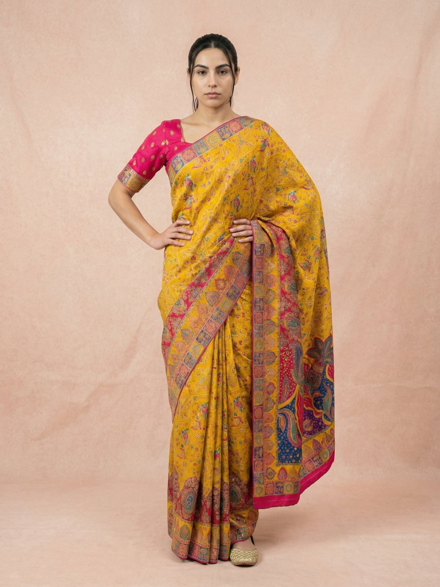 festive yellow silk saree with multicolor zari border and rich pallu