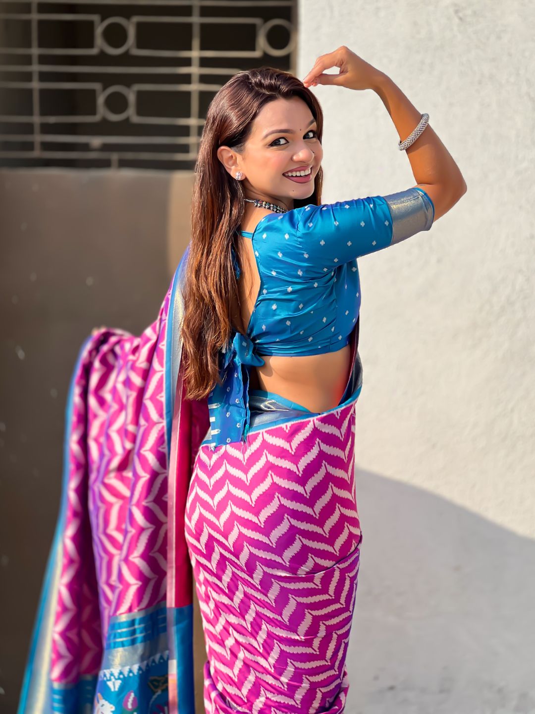 premium soft silk saree with woven ikat pattern and brocade blouse
