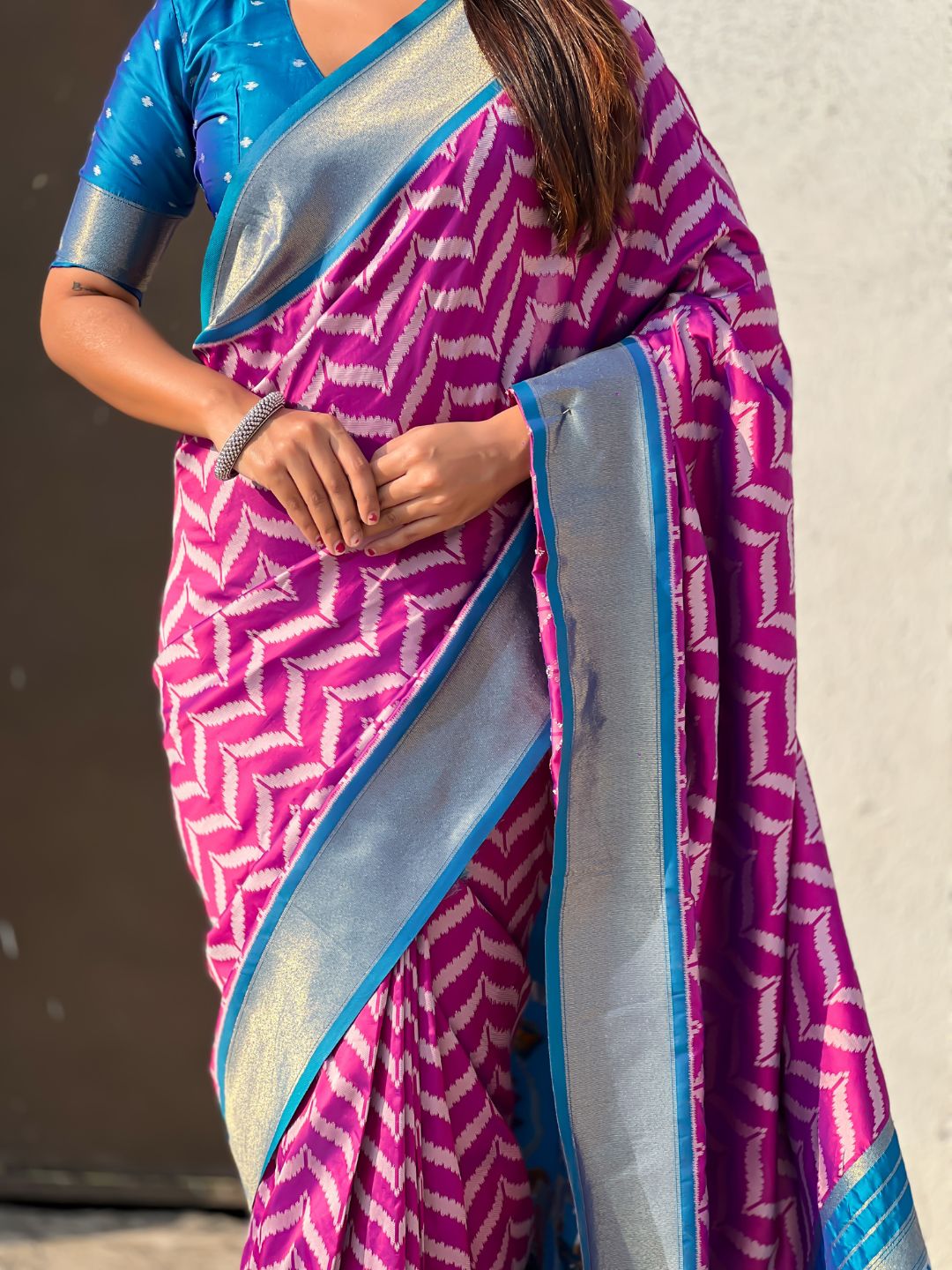 designer soft silk saree with traditional motifs and rich texture
