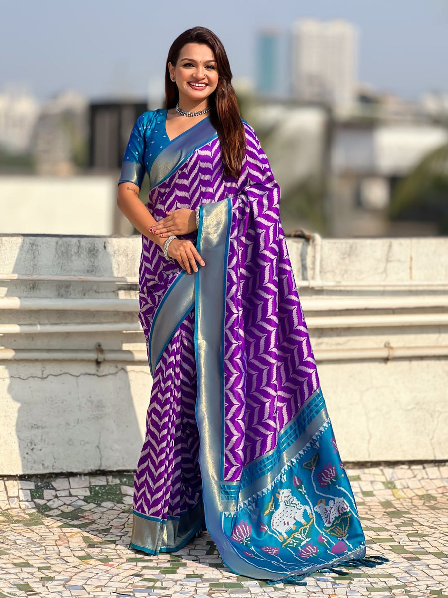 purple soft silk saree with ikat motifs and zari weaving design