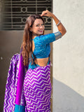 premium purple silk saree with artistic pichwai design pallu