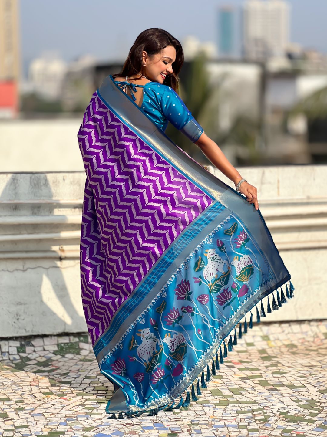 festive purple saree with zari weaving and smooth elegant drape