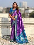 purple soft silk saree with ikat motifs and zari weaving design