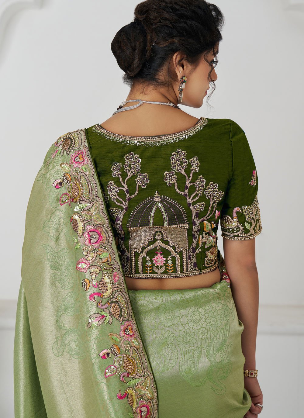 Mehendi Green Dola Silk Saree with Embroidery and Bird Motifs for Party Wear