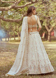 Beads and stone lehenga in cream color

