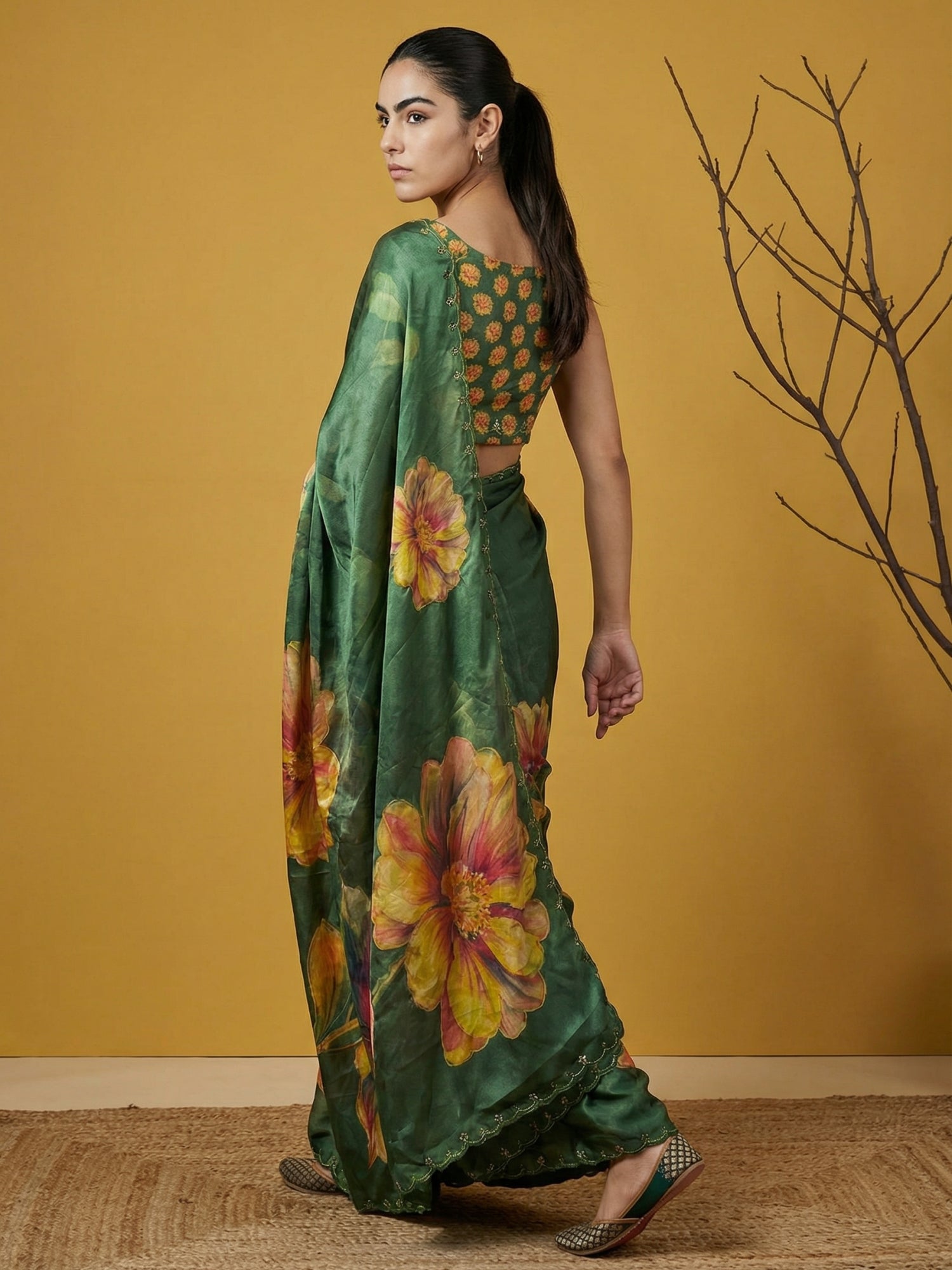 traditional satin saree with floral print and intricate handwork finish