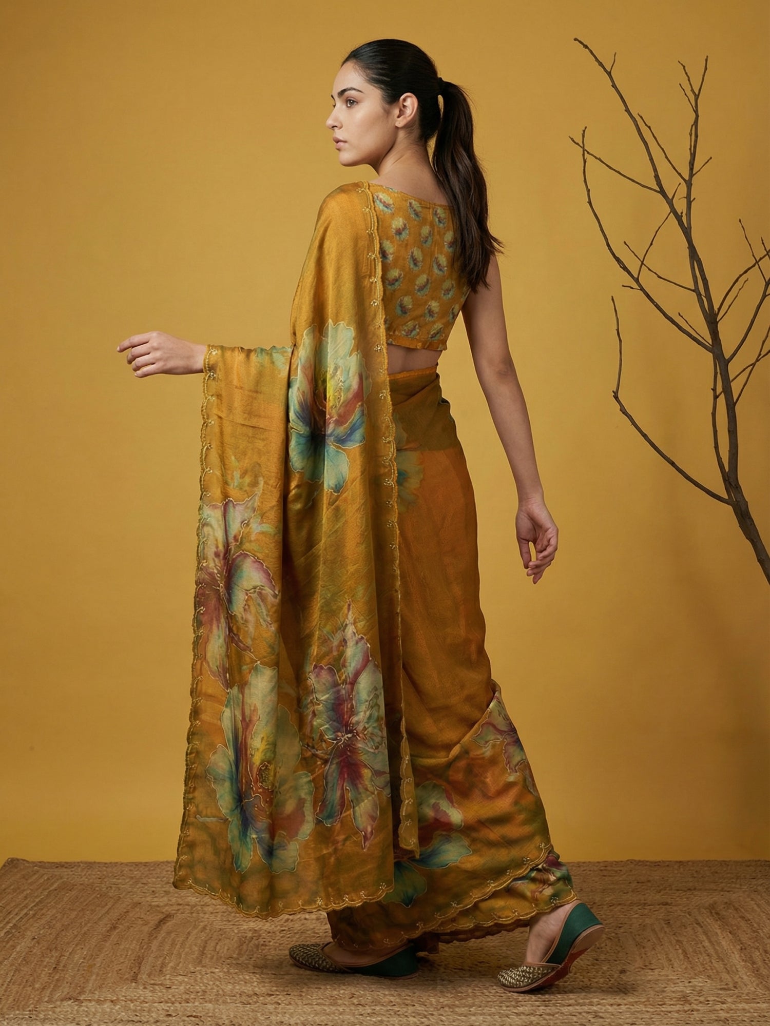 traditional satin saree with refined floral print and handwork finish