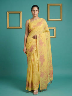 yellow muga cotton saree with elegant pencil art detailing