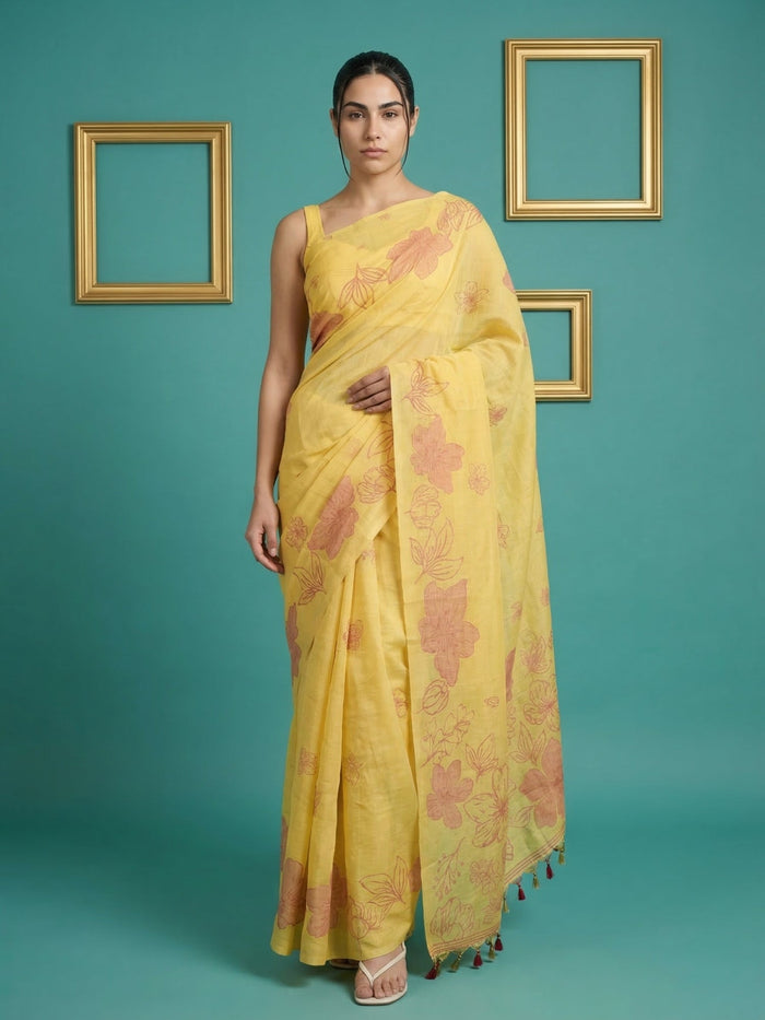 yellow muga cotton saree with elegant pencil art detailing