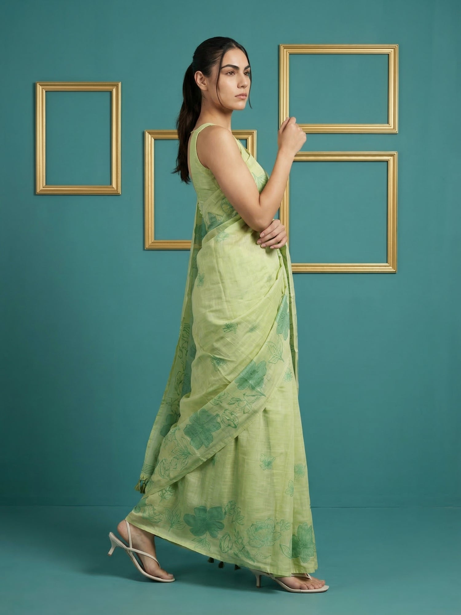 festive green saree with soft texture and handcrafted art work