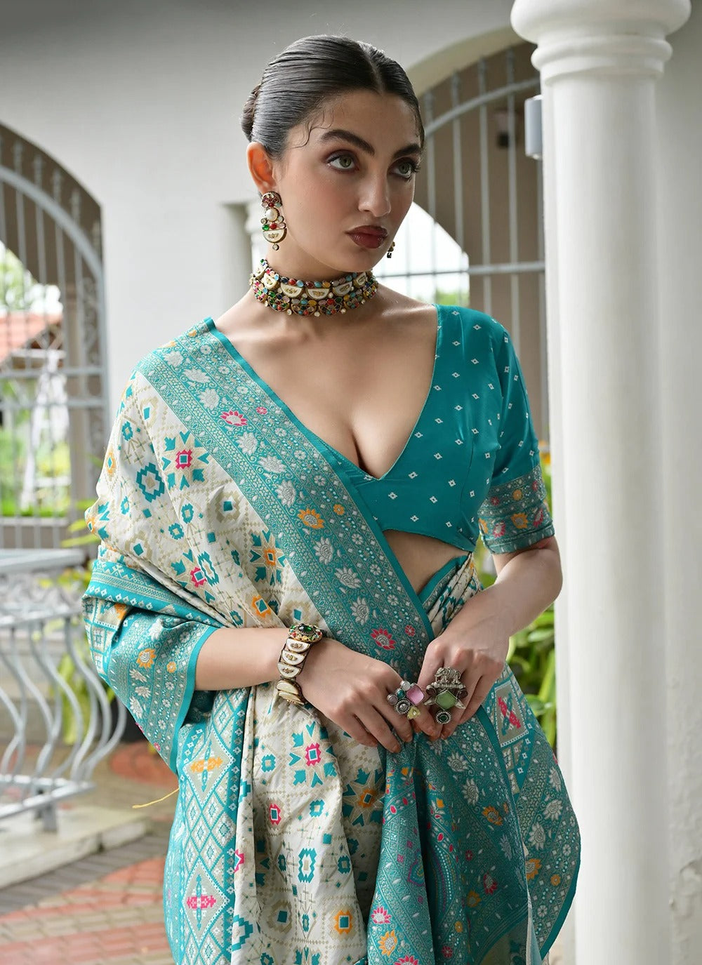 Pastel sea green Patola saree with rich woven pallu