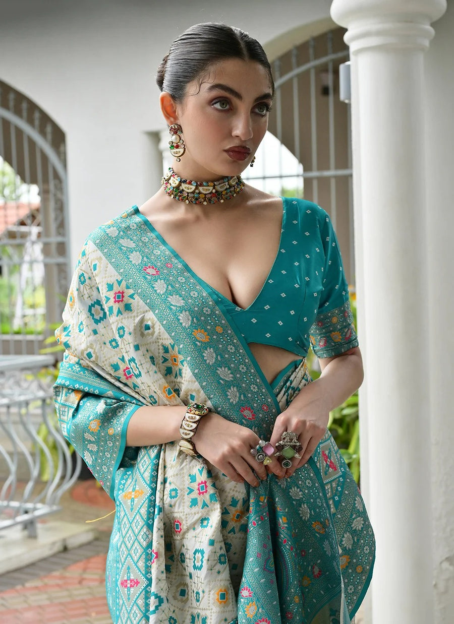 Pastel sea green Patola saree with rich woven pallu