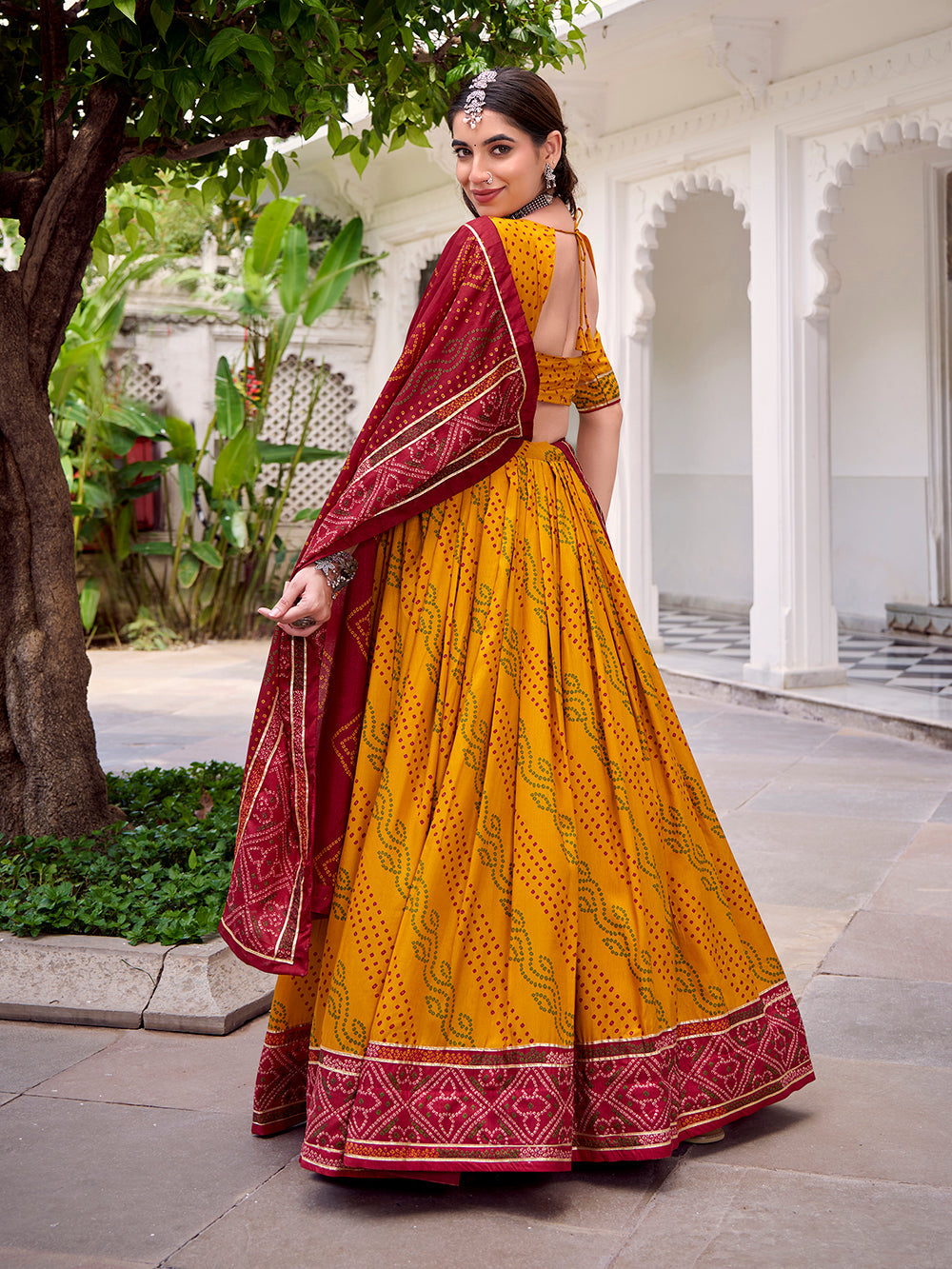 Yellow tasar silk dupatta with lace detailing