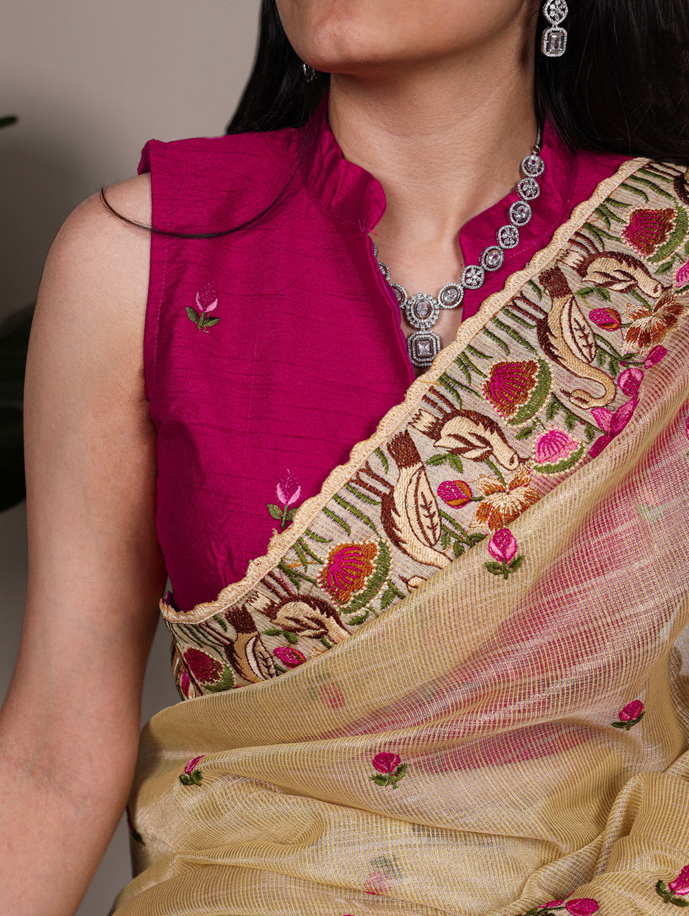 Floral thread embroidered gold saree