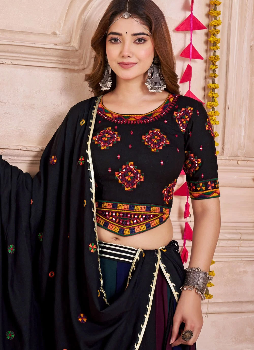 Close-up of lampi bordering and multicolor viscose cotton lehenga detail