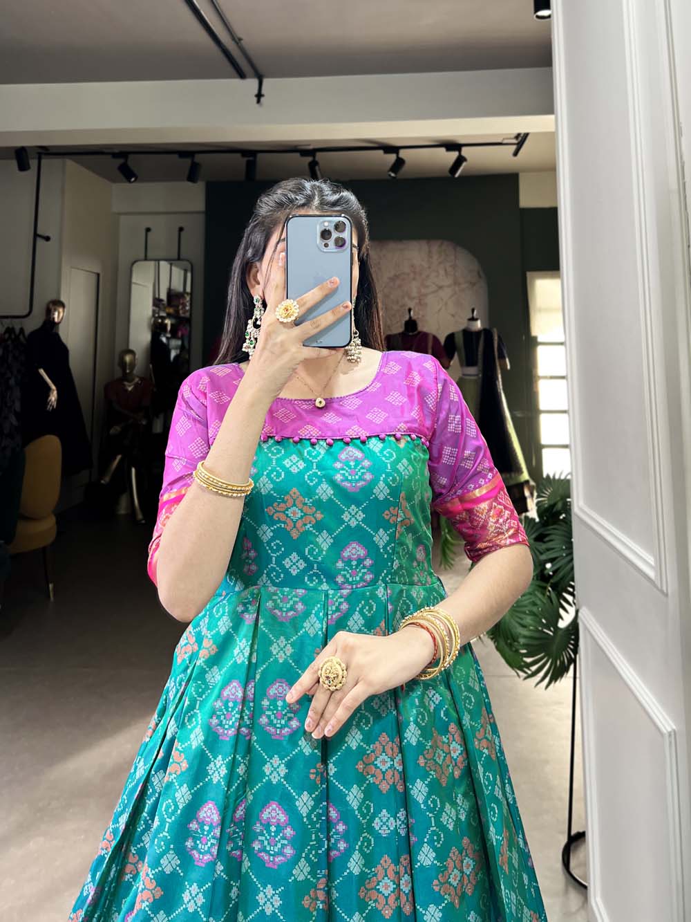 Bottle Green Color Jacquard Silk Patola Print With Zari Weaving Work Gown
