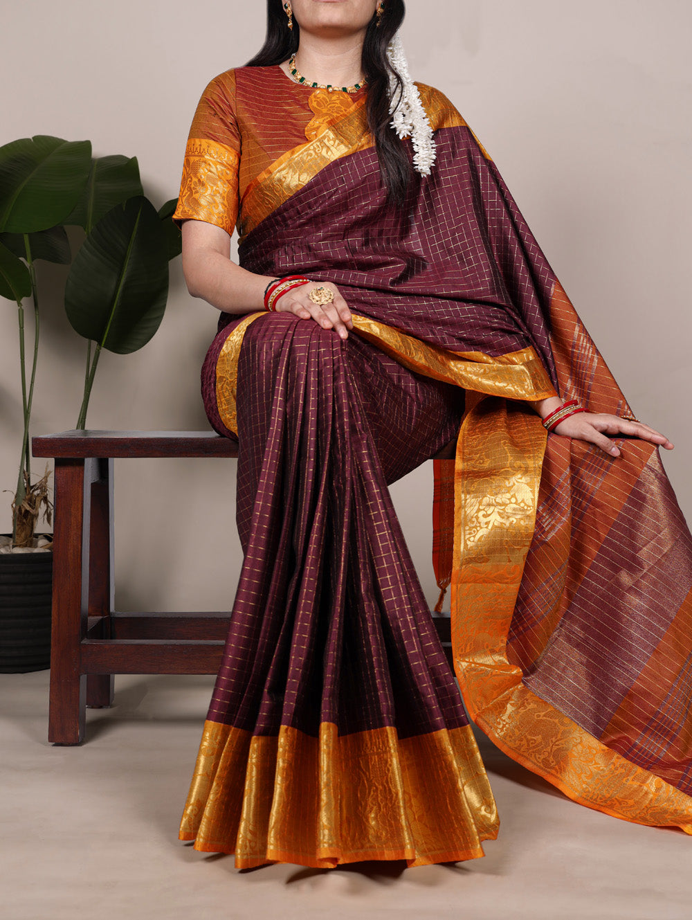 Brown poly cotton chex saree with zari weaving