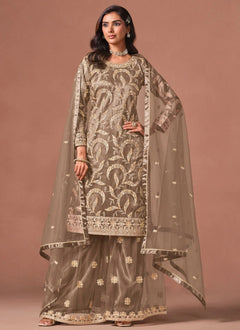 Brown palazzo salwar suit featuring intricate embroidery, sequins and zari work