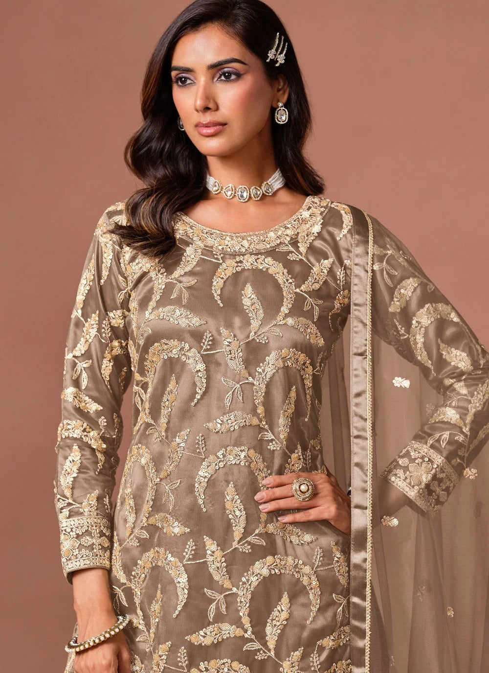 Brown party wear palazzo suit with detailed zari and sequins embellishment.