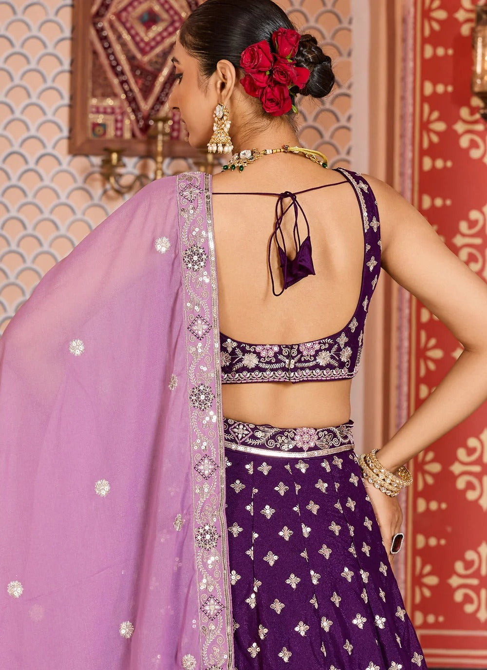 Burgundy tissue silk engagement lehenga with zari embroidery