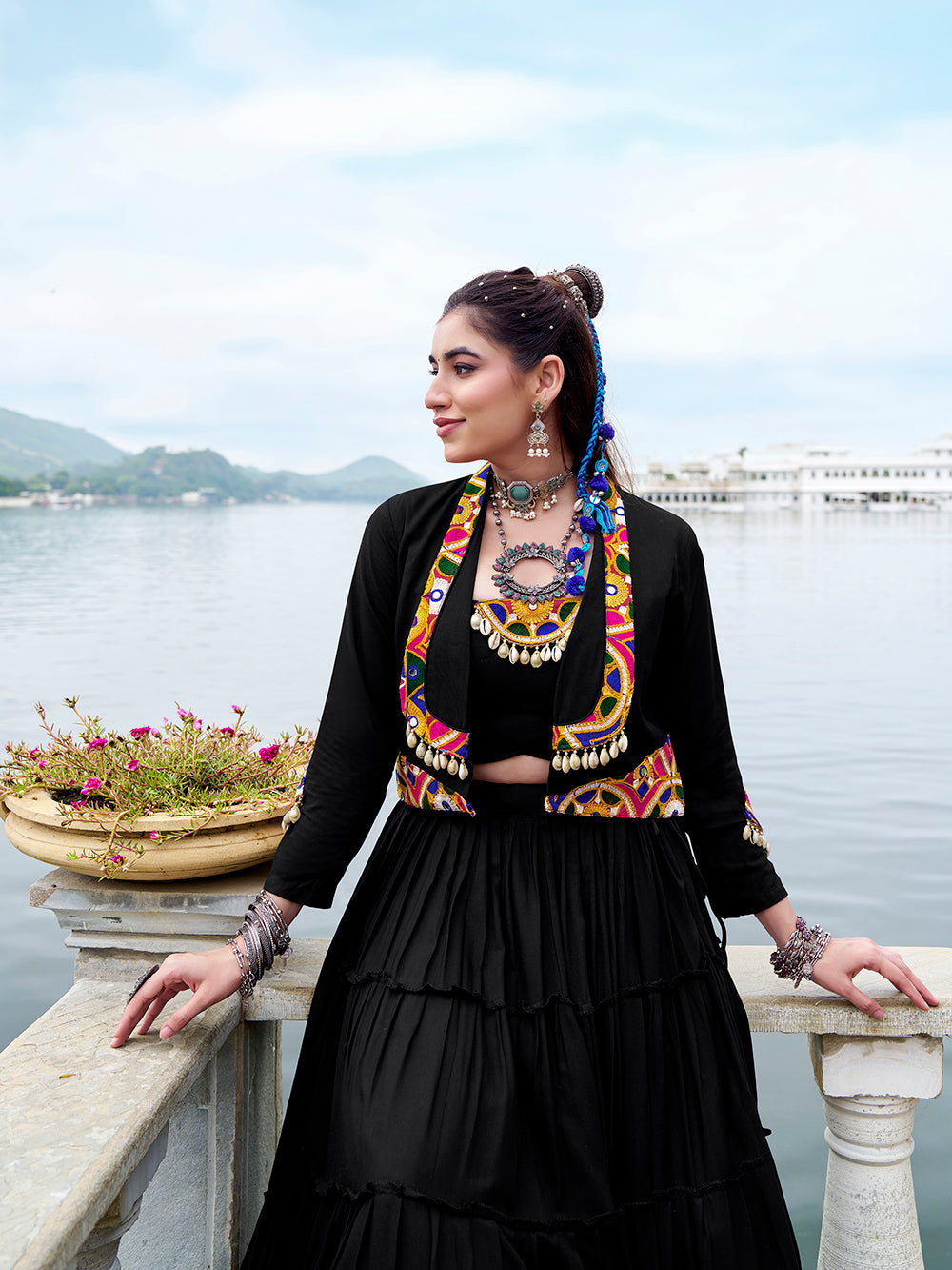 Black festive lehenga with 10-meter flair