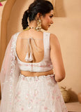 Cream net blouse with sweetheart neck and heavy embroidery