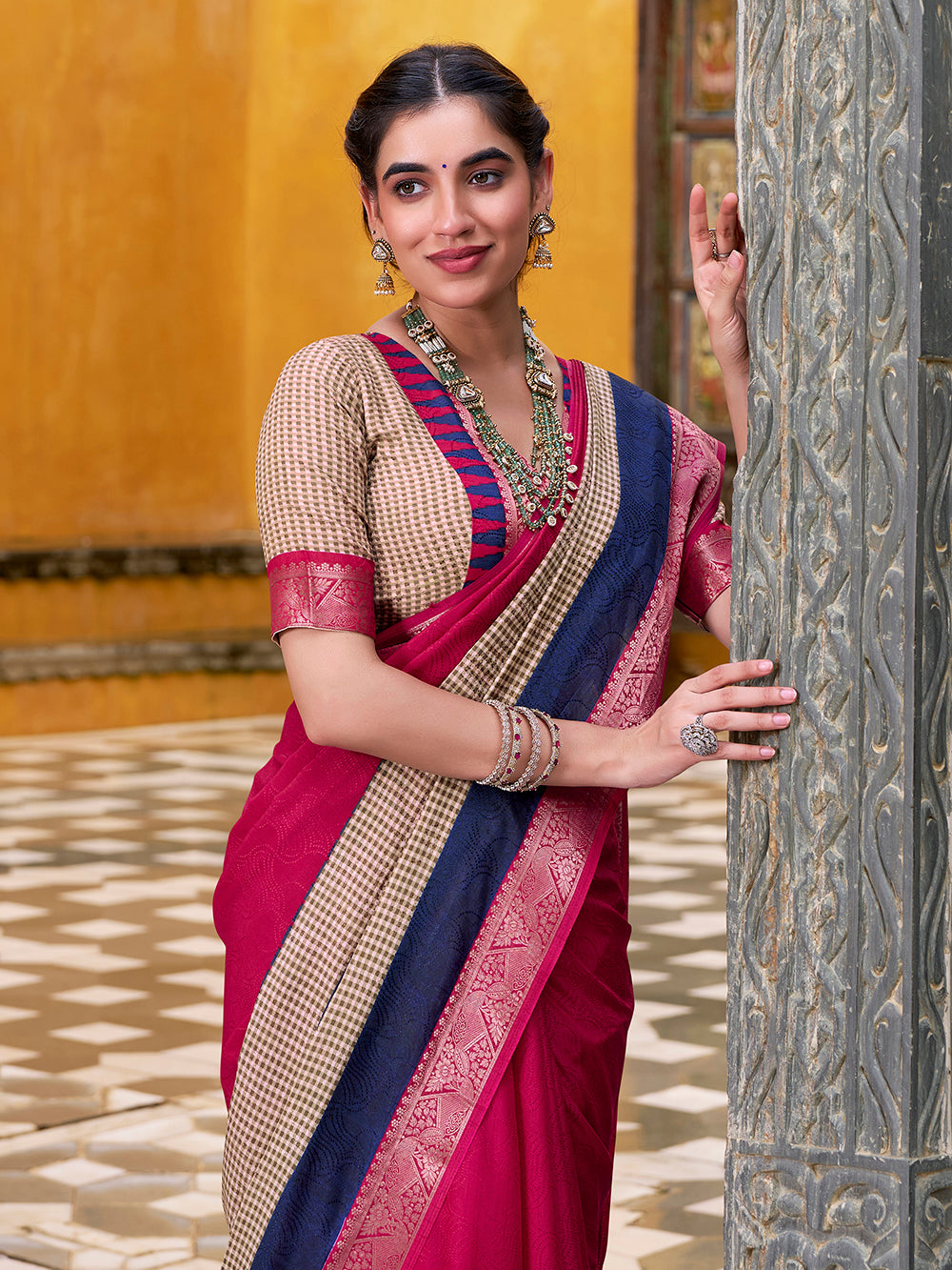Traditional pink saree with zari border