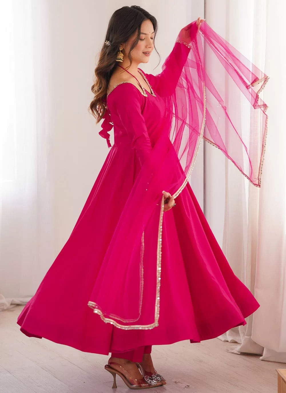 Elegant dark pink Anarkali suit for reception wear