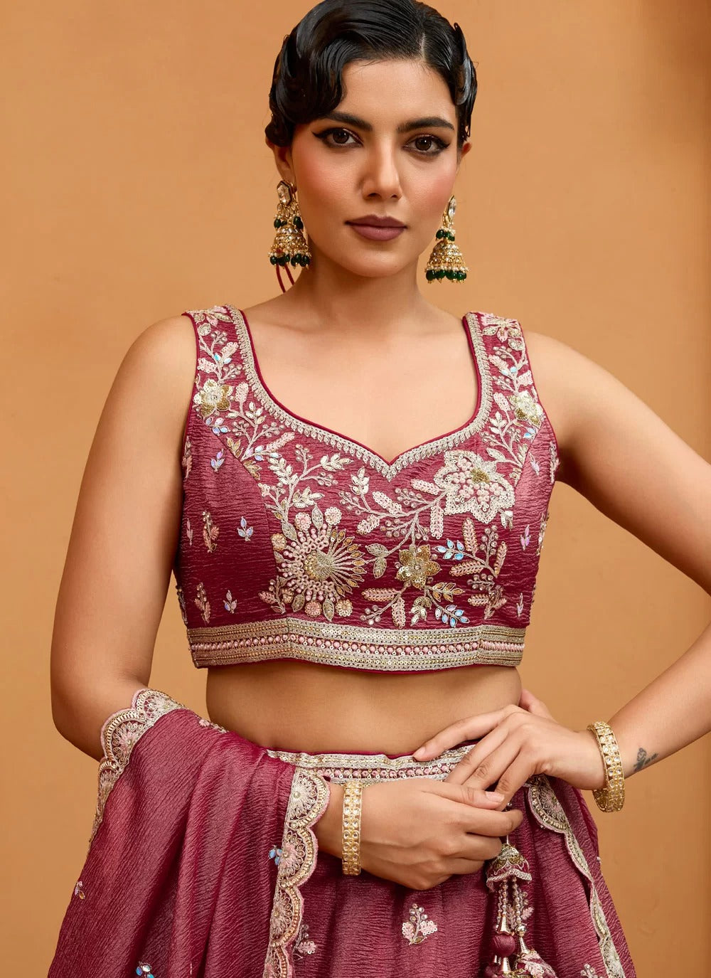 Opulent rosegold tissue designer party wear lehenga with sequin, stone, and coding embroidery, cutwork dupatta and 3.5m flair