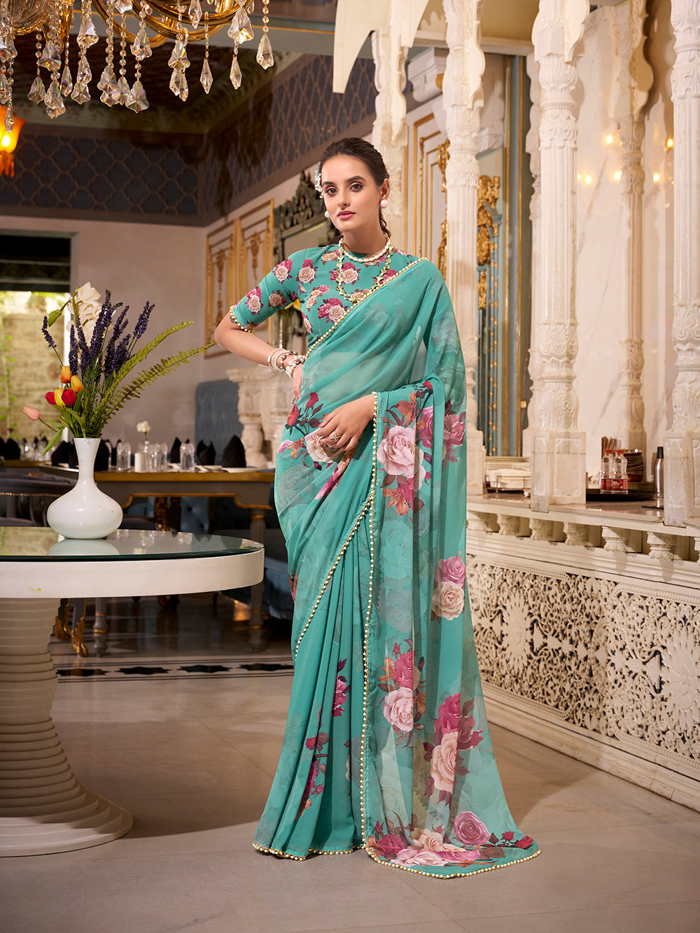 Green printed saree with matching blouse