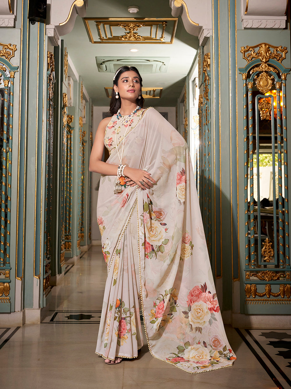 Off white printed saree with matching blouse fabric