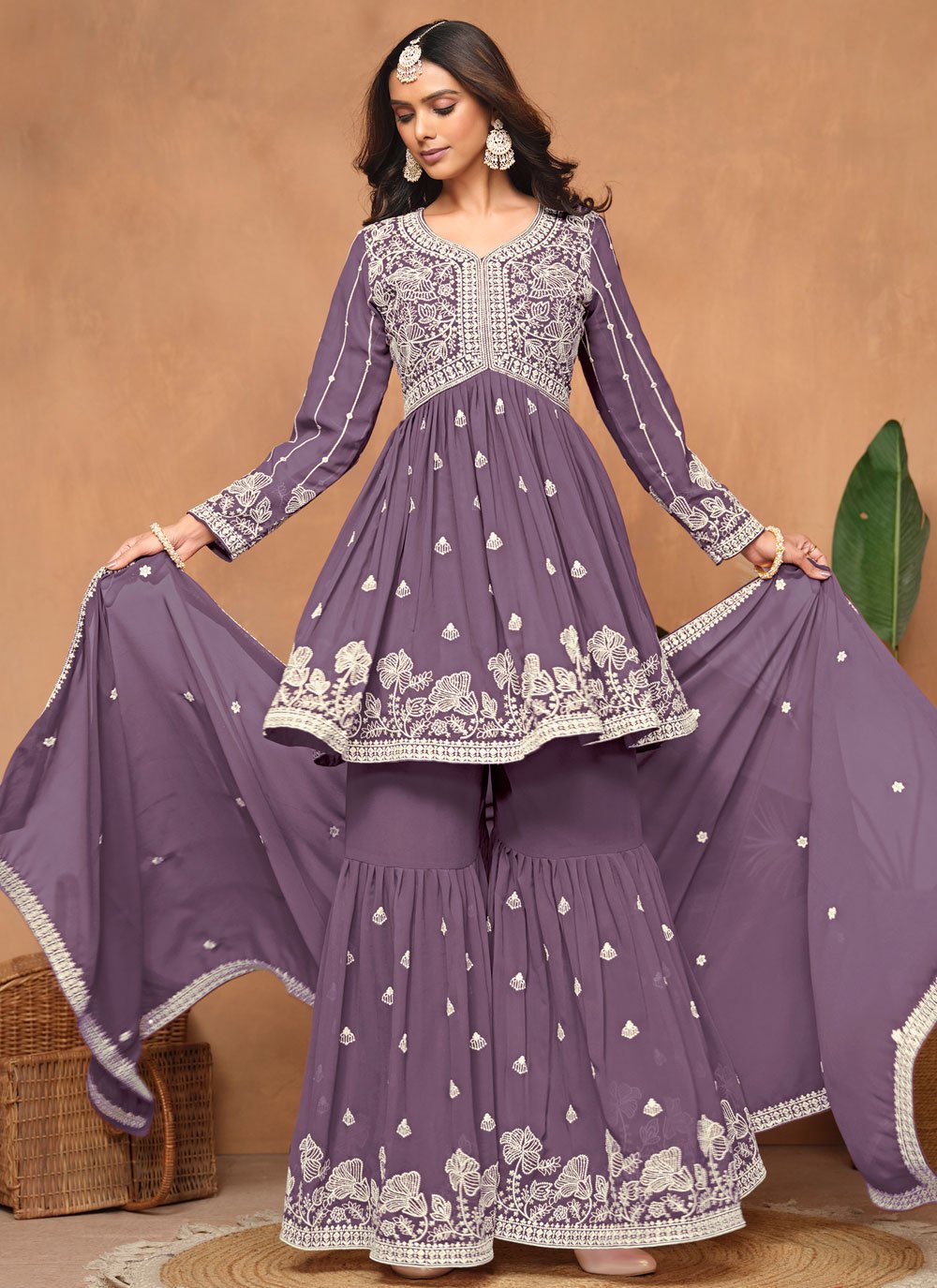 Elegant Purple Embroidered Sharara Style Suit in Faux Georgette