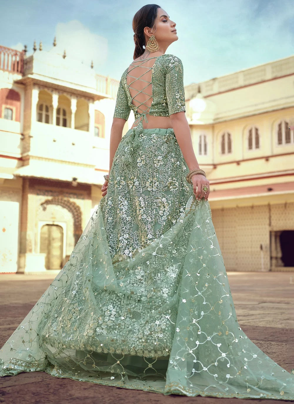 Elegant Soft Net Green Engagement Lehenga with Sequins, Thread, and Stone Work
