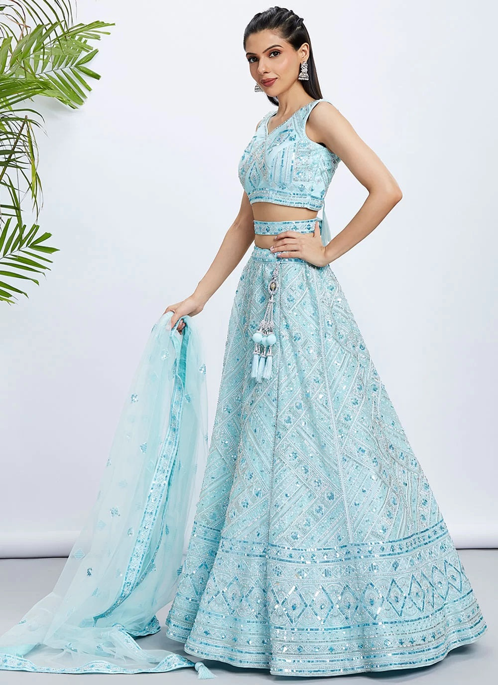 Elegant Turquoise Blue Net Engagement Lehenga With Intricate Cutdana & Sequins Work