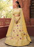 Elegant Yellow Lehenga with Intricate Zarkan Embroidery