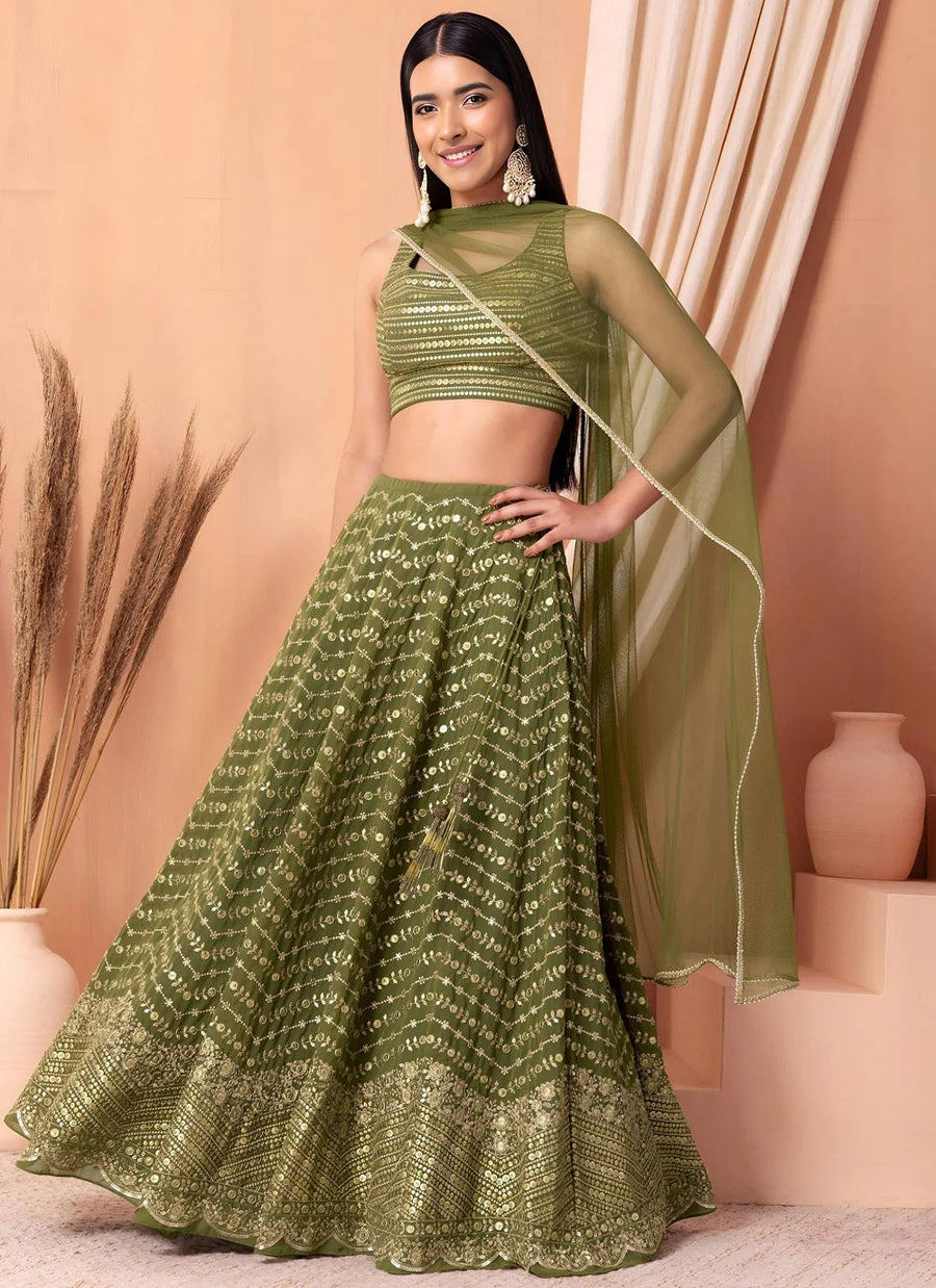Emerald green engagement lehenga with sequins embroidery