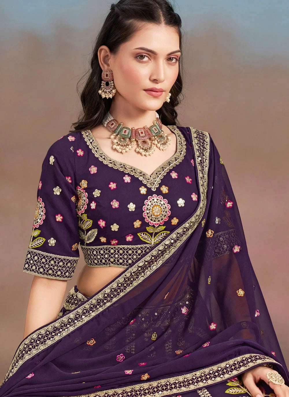 Purple georgette engagement wear lehenga with sequins, zari, dori and multicolor thread embroidery