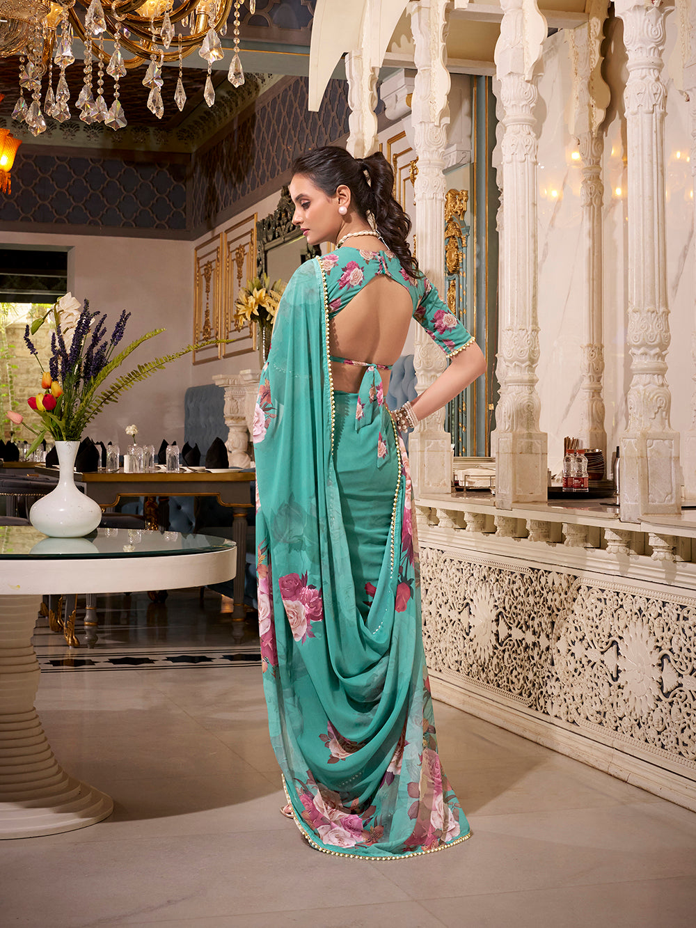 Green saree with elegant lace border