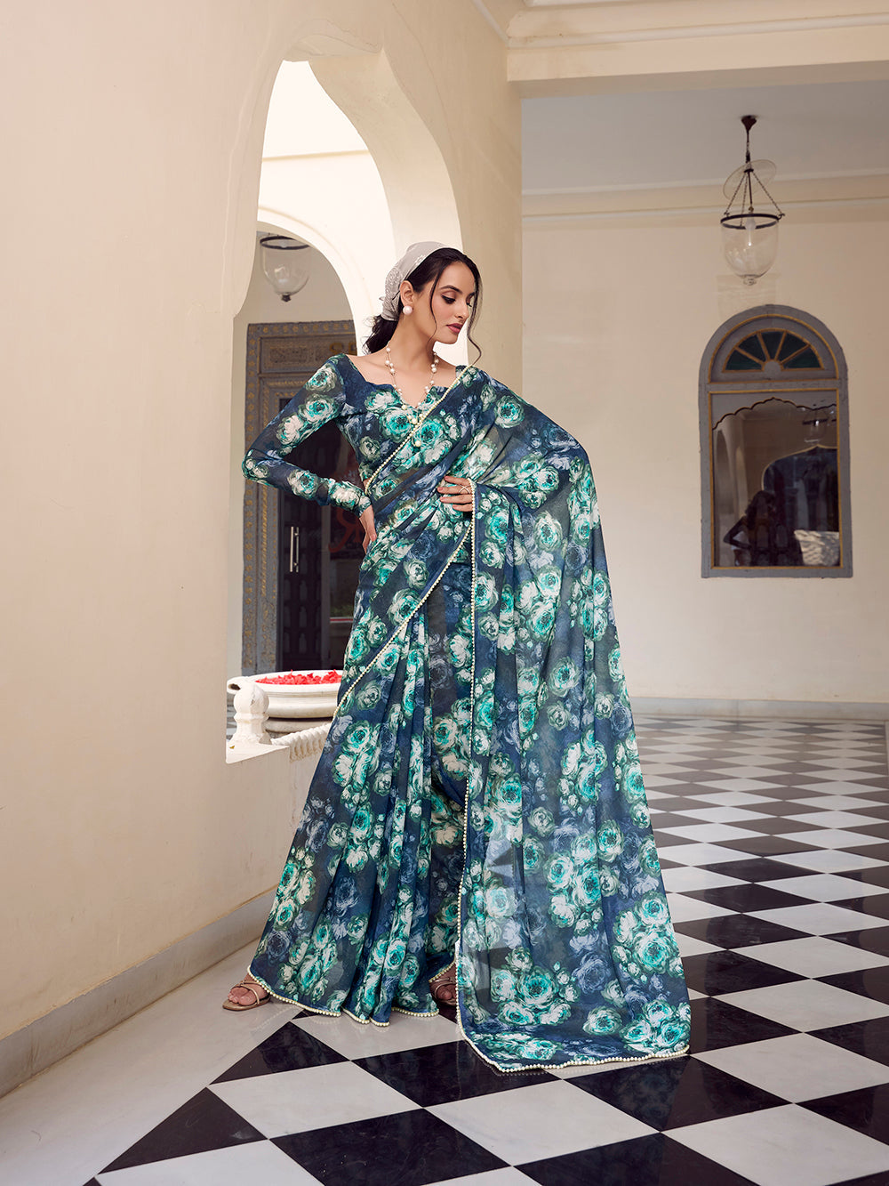 Weightless navy blue saree with pearl lace border