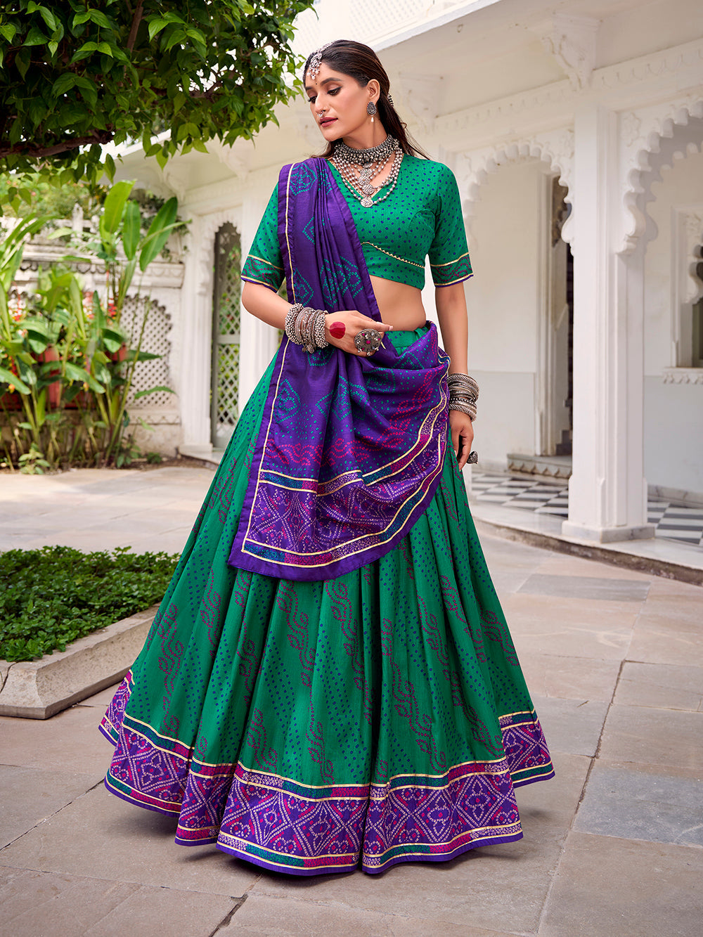 Green bandhej lehenga with gotta patti lace