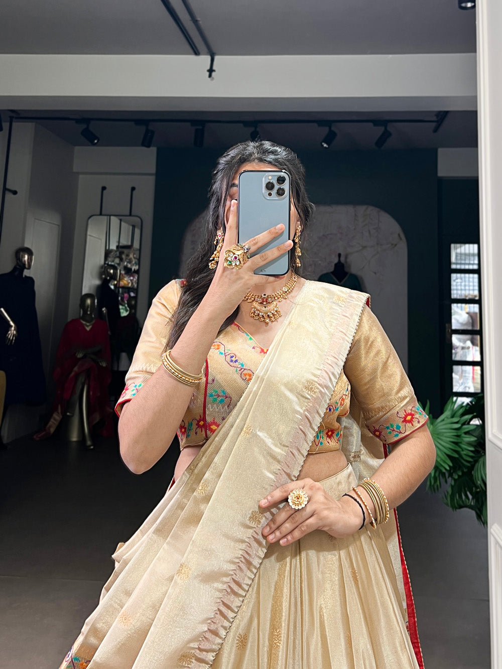 Red festive lehenga choli with tassel dupatta