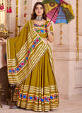 Mirror and lampi border work closeup on fluorescent green lehenga