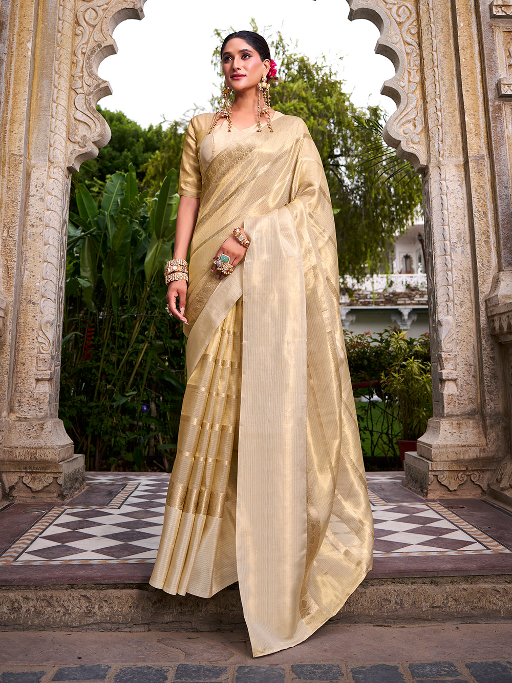 Gold tissue saree with classic zari border