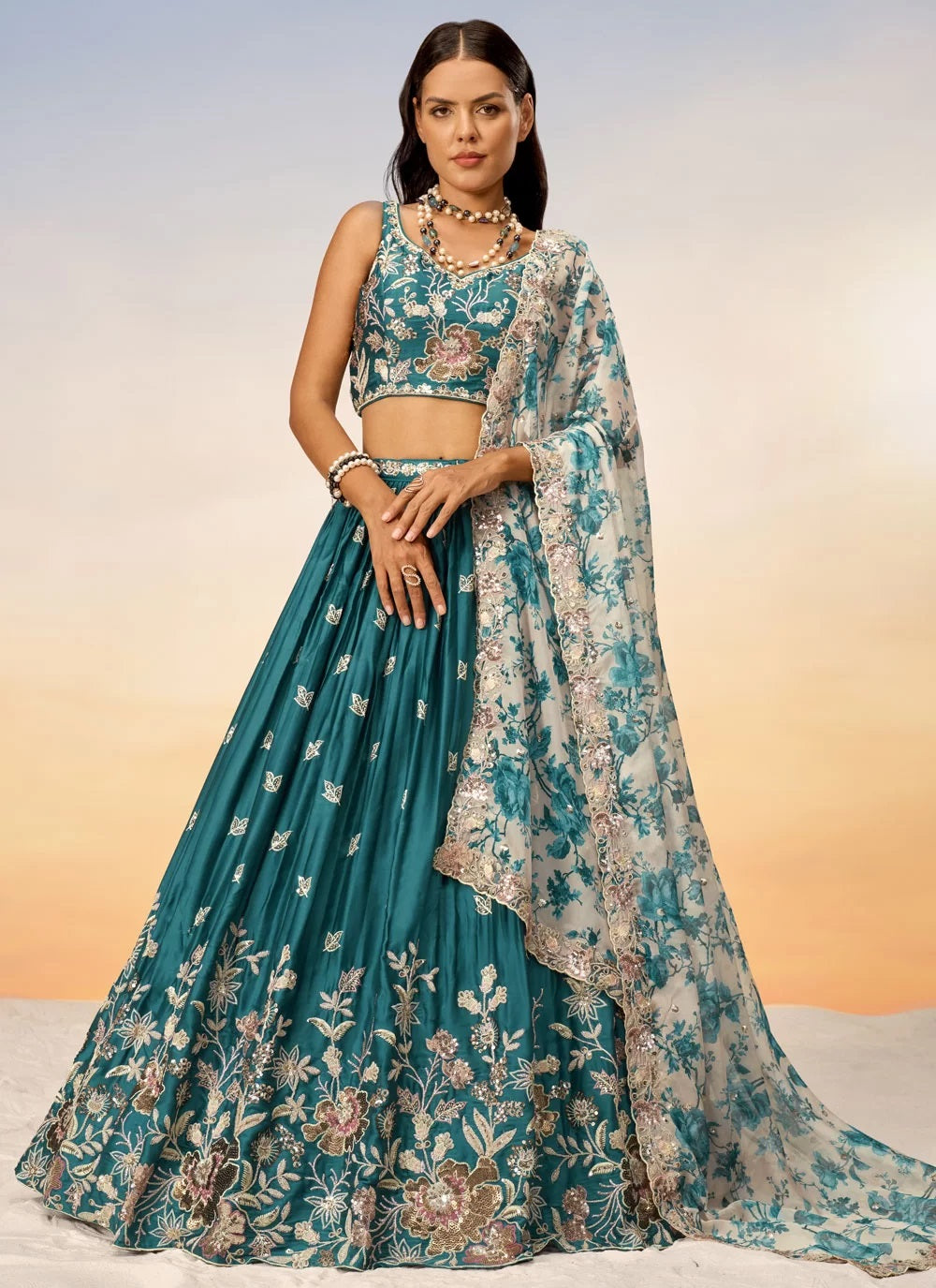 Graceful Teal Poly Chiffon Reception Wear Lehenga Choli with Net Dupatta